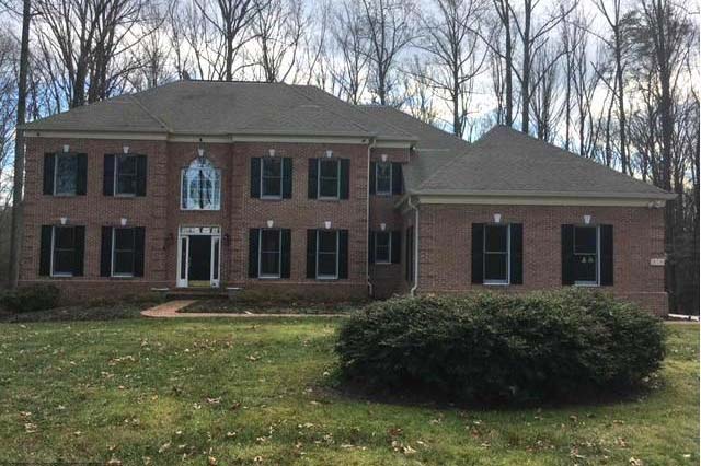 This 1998 Colonial-style home at 10591 Canterberry Road Fairfax Station, is listed by Jane Applegate.