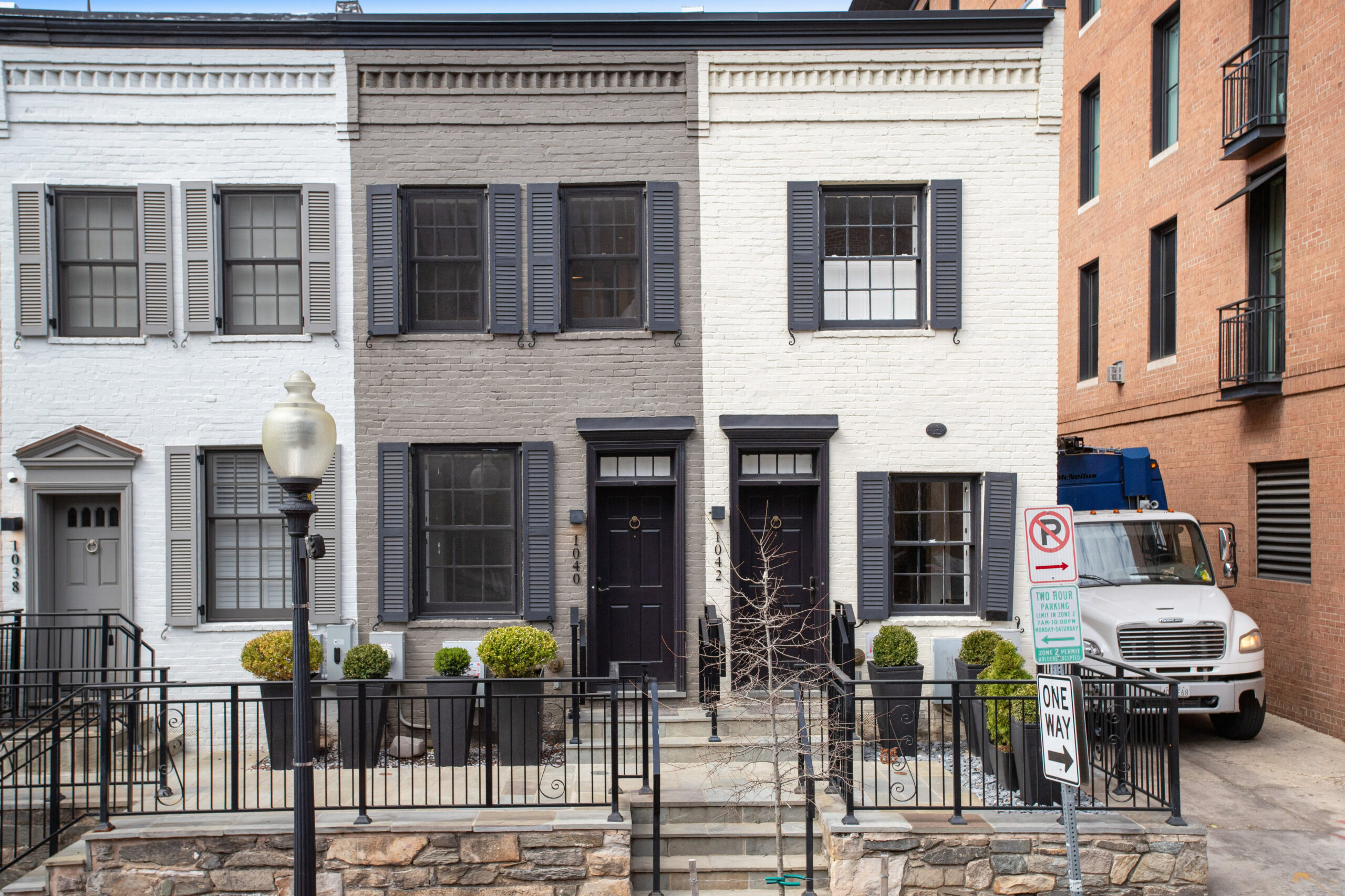 These historic townhouses are nestled on a picturesque street in historic Georgetown.